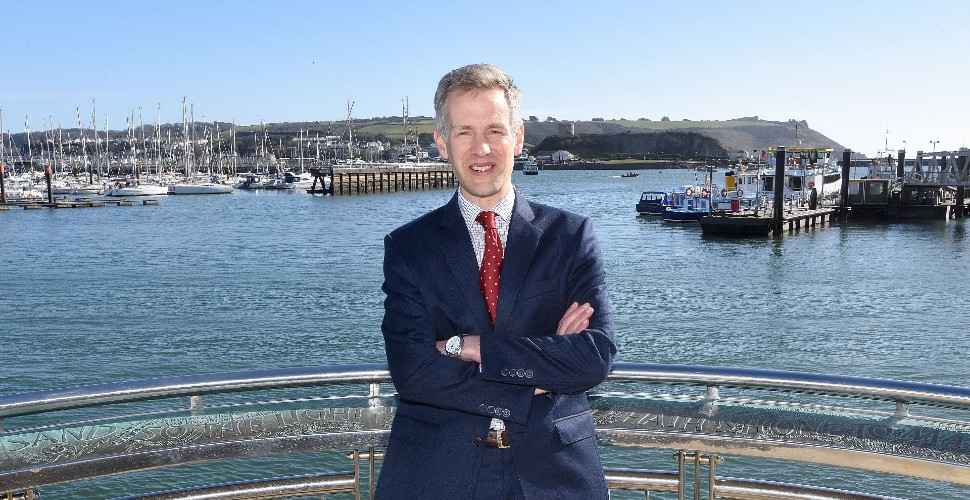 Outgoing Chief Executive of Mayflower 400, Charles Hackett, stood at the Mayflower Steps